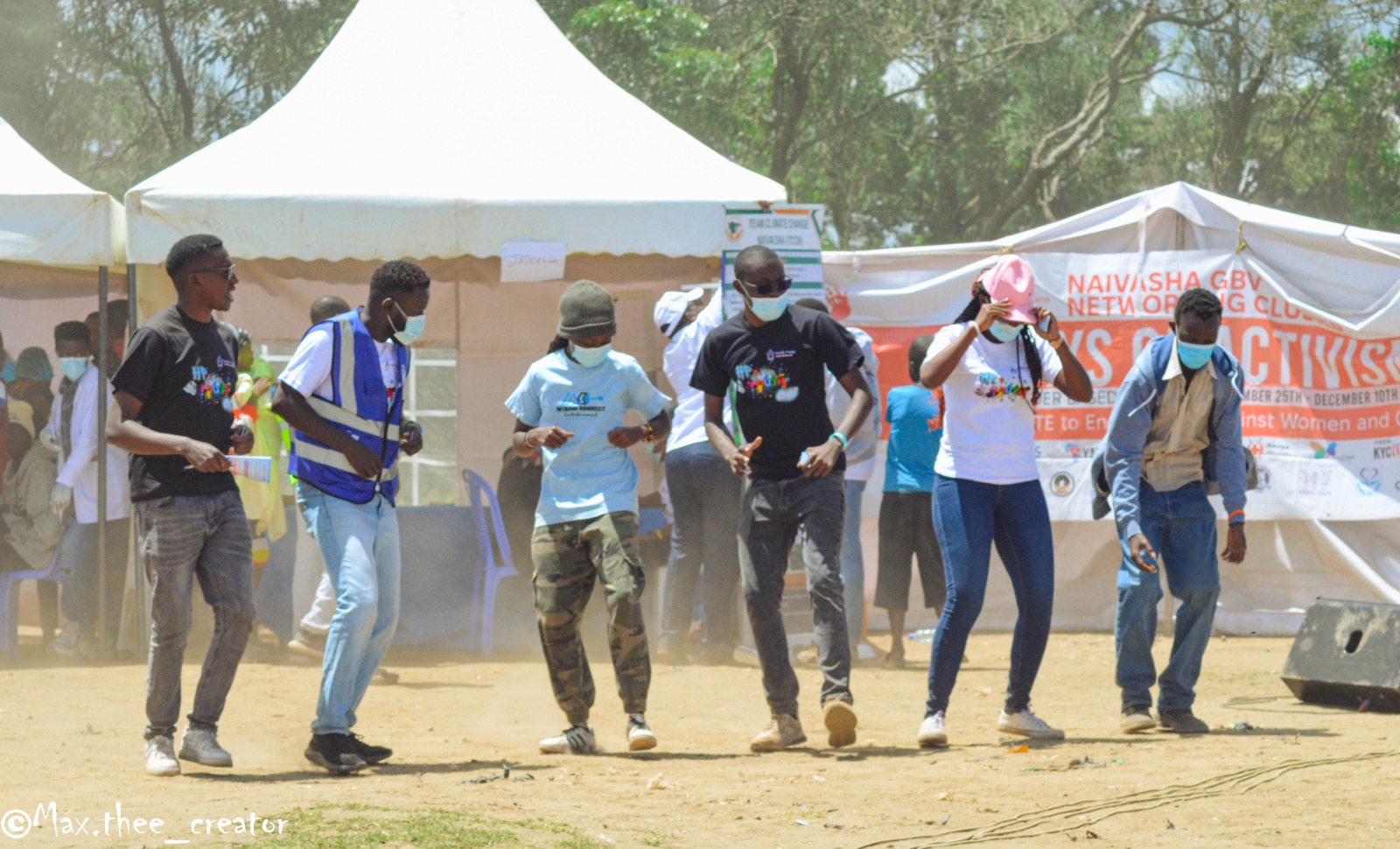 Participants dancing at a community awareness event